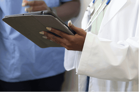 Doctor with tablet